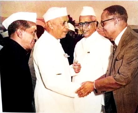 B. Vaikunta Baliga in official capacity